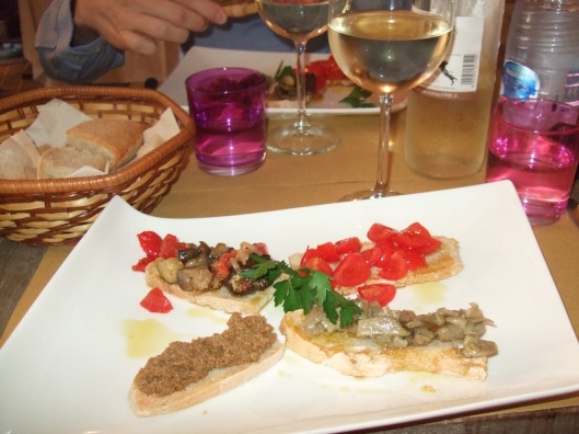 A delightful appetizer of different types of bruscetta