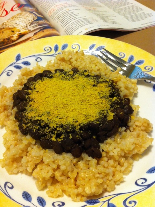 Here's nutritional yeast sprinkled (generously) on black beans and rice.
